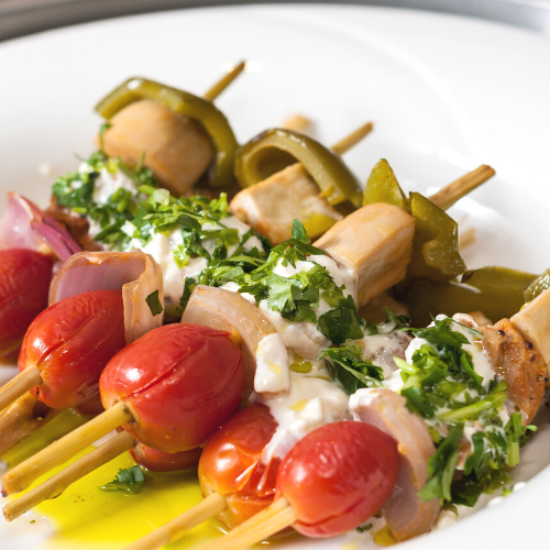 Rosemary herbed food with cherry tomatoes onion olives and olive oil