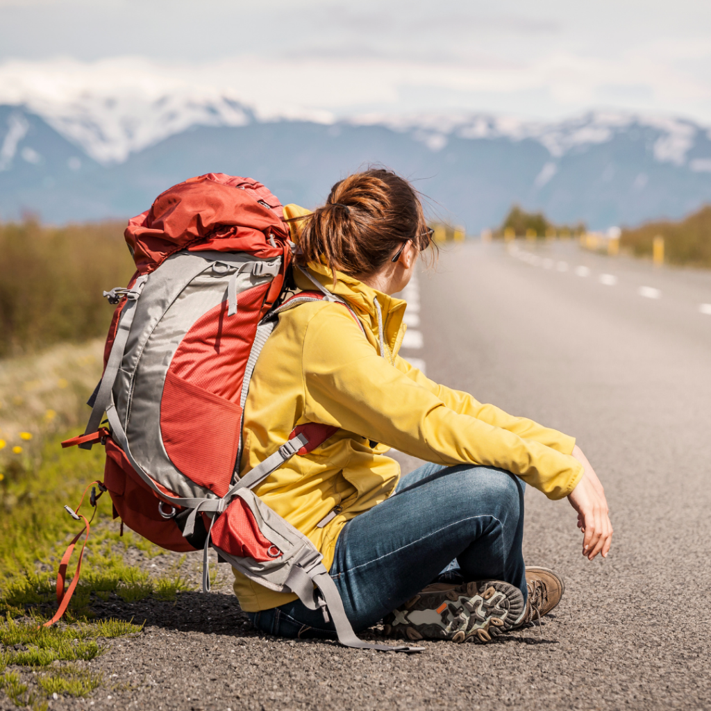 budget travel women backpack hitch-hiking