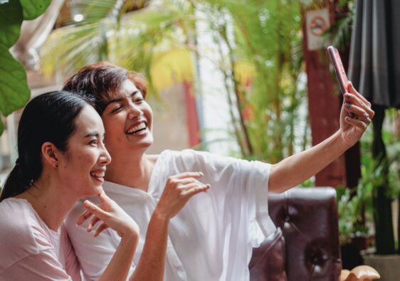 smiling group selfie filipina