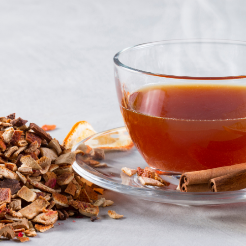 Cats Claw Herb Tea in a glass cup