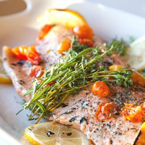 Thyme Tea in Salmon with fresh herbs and cherry tomatoes